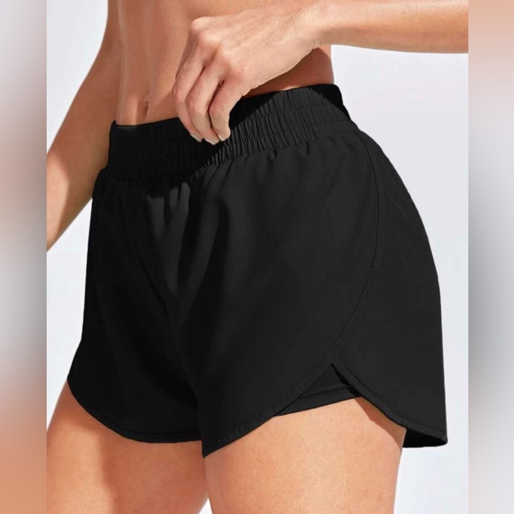 NWOT, Never Worn. Breathable Sports Shorts with Spandex Inside.